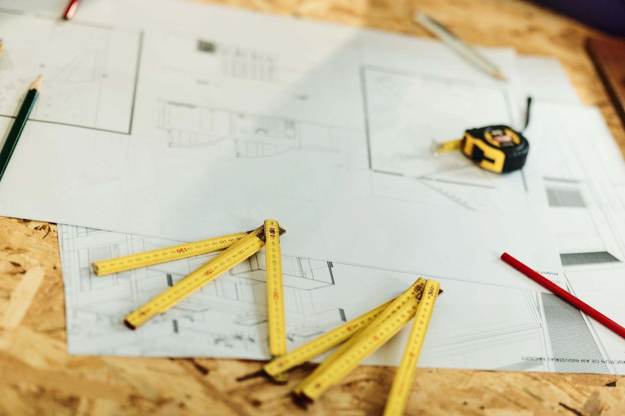 Construction paperwork and tools used for estimating and quotes