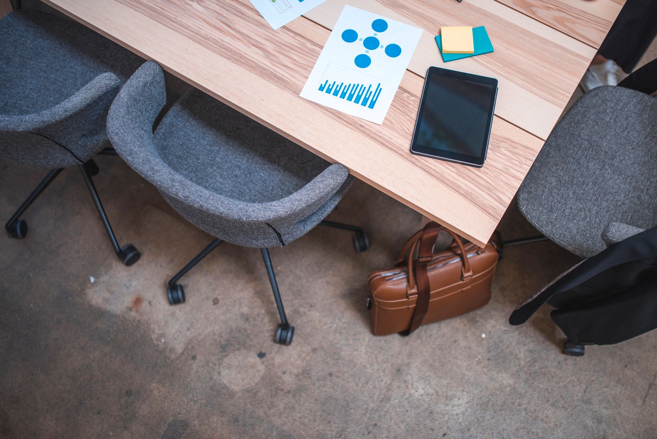 Renovation planning notes and documents on a desk